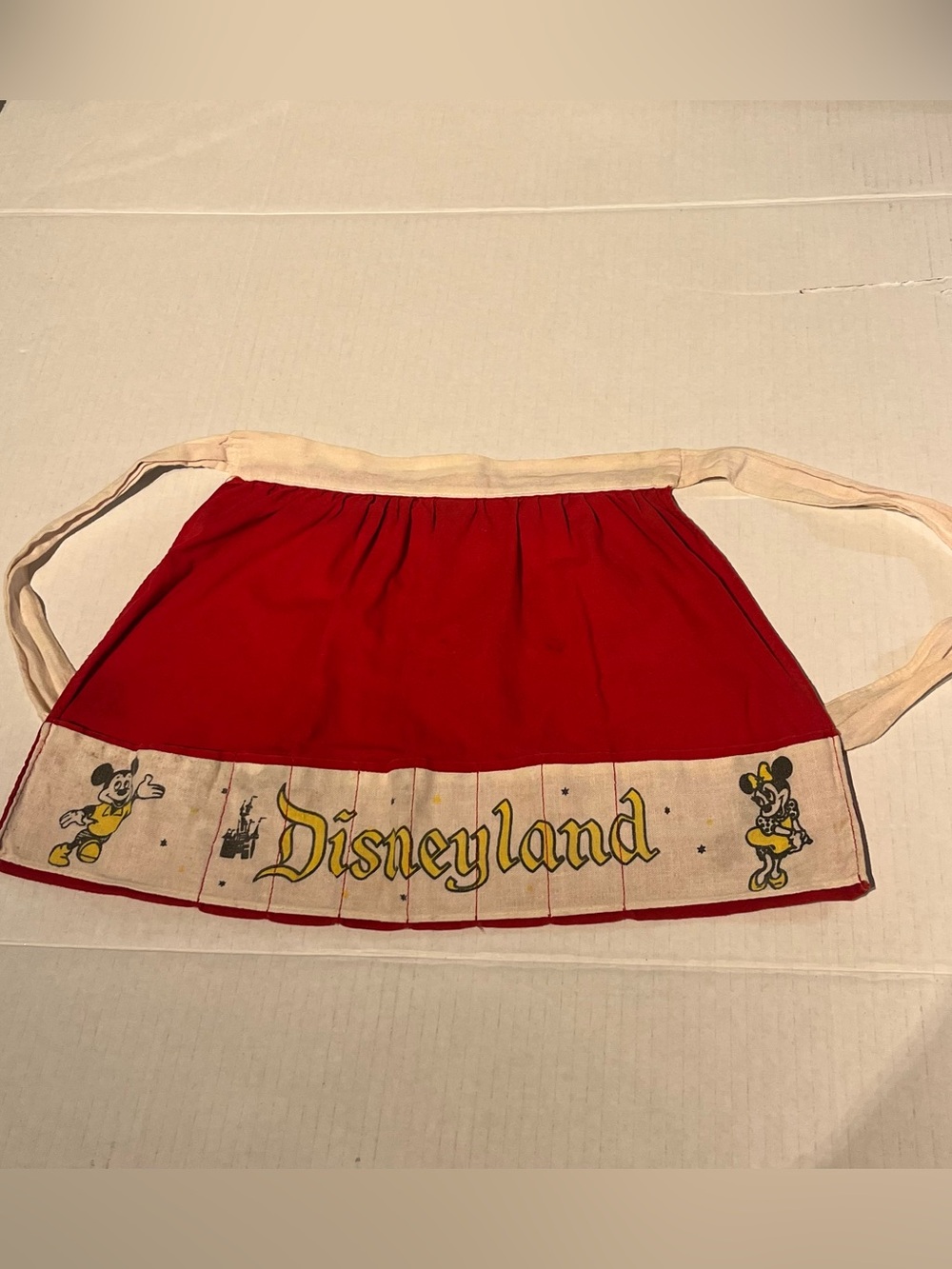 Vintage 1960s Disneyland theme park memorabilia - Child’s Half Apron.